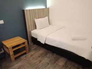 Postel nebo postele na pokoji v ubytování The Verve Hotel PJ Damansara