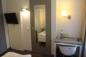 TV a/nebo společenská místnost v ubytování Altstadt Hotel Baunachshof