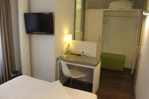 TV a/nebo společenská místnost v ubytování Altstadt Hotel Baunachshof