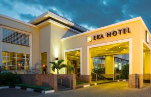 a hotel with a sign on the front of it at Eka Hotel Nairobi in Nairobi