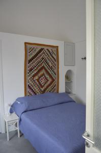 Posteľ alebo postele v izbe v ubytovaní kammamia