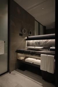 Postelja oz. postelje v sobi nastanitve Yunhe Yebo Hotel (Shanghai International Tourism Resort Pudong Airport)