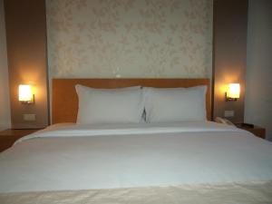 Postel nebo postele na pokoji v ubytování Drego Hotel