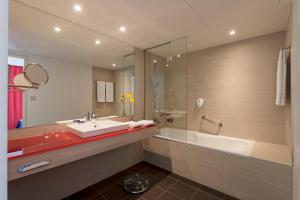 Kupatilo u objektu Park Inn by Radisson Linz