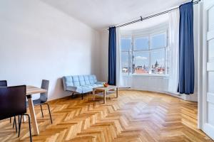 Posedenie v ubytovaní Avantguard Apartments