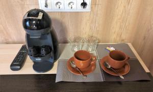 Принадлежности для чая и кофе в Отель Топаз-Кола