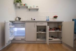 Kuchnia lub aneks kuchenny w obiekcie Proseco Apartments -Self check-in-