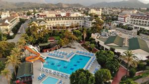 an aerial view of a resort with a pool at Lucida Beach - All Inclusive in Kemer