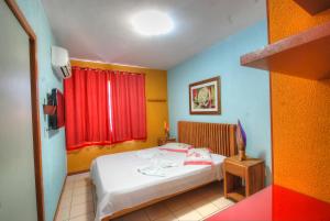 Cama o camas de una habitación en Flat Luxo Ponta Negra