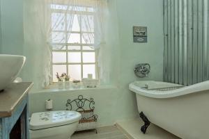 Ванна кімната в Shanzeley Guest House