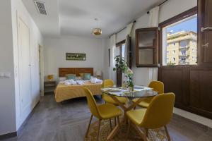 Posedenie v ubytovaní Apartamentos El Marqués