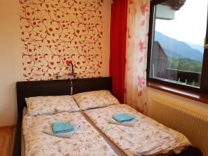 Postel nebo postele na pokoji v ubytování Apartments Helga