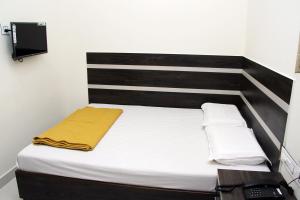 Postel nebo postele na pokoji v ubytování Mp Residency