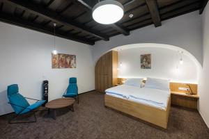 En eller flere senge i et værelse på Fancy apartments by Prague Castle