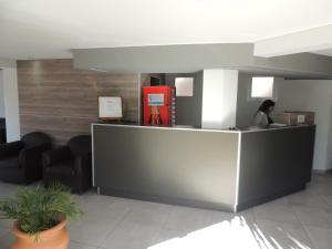 Lobbyn eller receptionsområdet på Casa Nostra Hotel