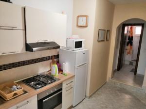 Kuchyň nebo kuchyňský kout v ubytování Apartments Mira