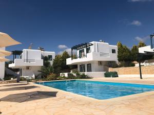 The swimming pool at or close to Cavo Plako Villas