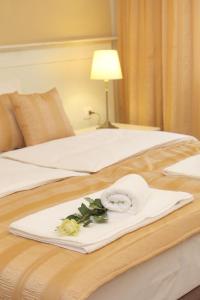 Cama o camas de una habitación en Booking Rooms