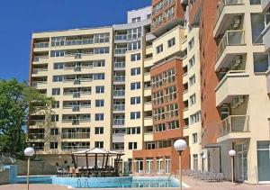 a large building with a gazebo in front of it at NikeaPark in Golden Sands