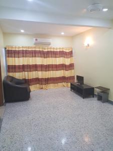 Posezení v ubytování Maha Hotel