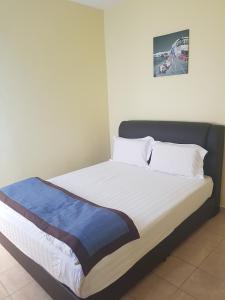 Postel nebo postele na pokoji v ubytování Maha Hotel