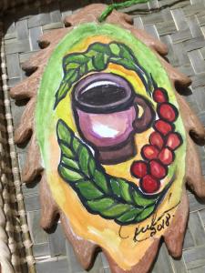 a painting of a drink and fruit on a plate at Casa Jhada-Xilitla in Xilitla