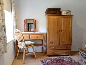 A television and/or entertainment center at Pixie Cottage 
