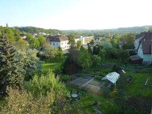 an aerial view of a garden with a greenhouse at Hotel Garni Jägerhof in Sigmaringen