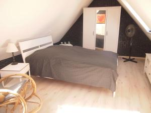 Tempat tidur dalam kamar di Fewo Sonnenschein