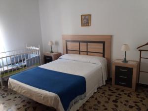 Postel nebo postele na pokoji v ubytování Alojamiento Familiar Conde Don Ramon