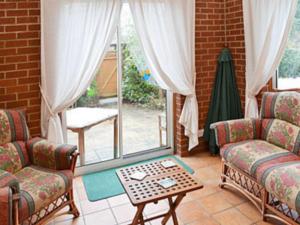 A seating area at Old Forge Cottage 