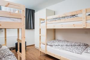 a bunk bed room with two bunk beds at FeWo Nocky in Turracher Hohe