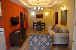 TV a/nebo společenská místnost v ubytování Paradise Place Apartments