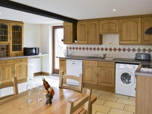 A kitchen or kitchenette at Nell'S Barn 