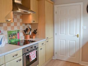 A kitchen or kitchenette at Dune 