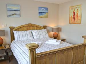 A bed or beds in a room at Dune 