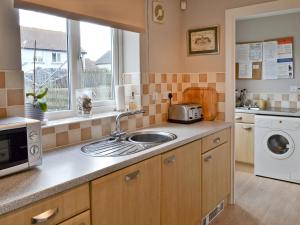 A kitchen or kitchenette at Dune 