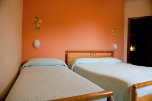 Letto o letti in una camera di Hotel Centrale di Paolo e Cinzia