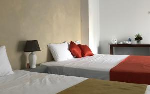 Postel nebo postele na pokoji v ubytování Hotel Star White - Negombo