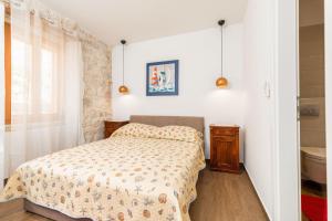 Posteľ alebo postele v izbe v ubytovaní Vintage house al pozzo
