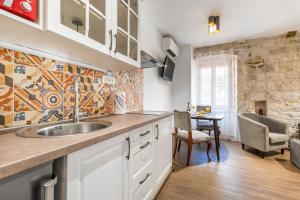Kuchyňa alebo kuchynka v ubytovaní Vintage house al pozzo