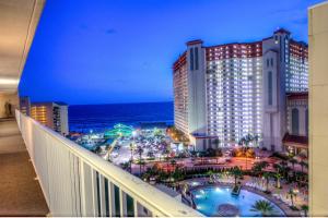 a view from a balcony of a hotel and the ocean at Laketown Wharf Resort 631 By Aneliya in Panama City Beach