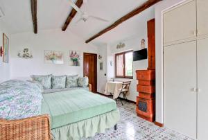 Posteľ alebo postele v izbe v ubytovaní Il Cottage di Villa Sveva, splendida vista mare