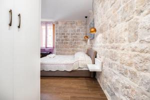 Posteľ alebo postele v izbe v ubytovaní Vintage house al pozzo