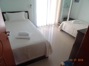 Posteľ alebo postele v izbe v ubytovaní Sea Side Lux family appartment