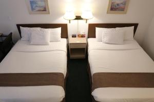 Postel nebo postele na pokoji v ubytování Didsbury Country Inn