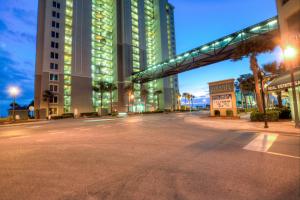 an empty street in front of a building at night at Grand Panama Resort 2-202 By Aneliya in Panama City Beach