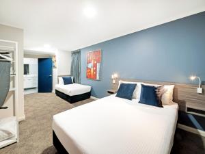 Кровать или кровати в номере 28 Hotel