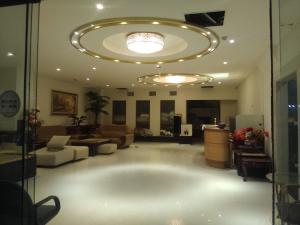 Ruang duduk di Dengfeng Milan Business Hotel