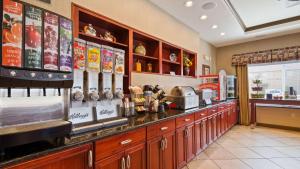 a fast food restaurant with a counter with food on it at Best Western Plus Montezuma Inn and Suites in Las Vegas